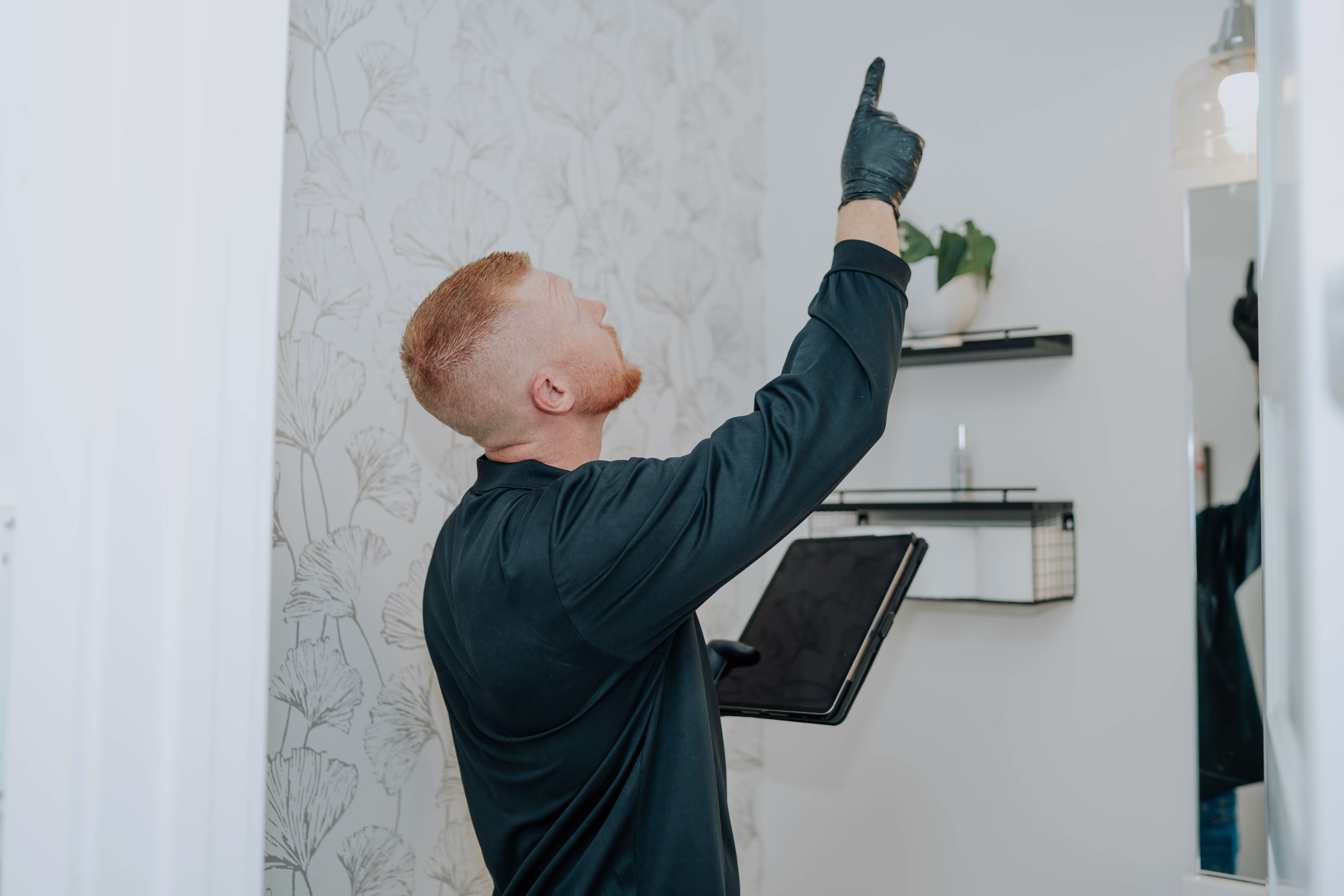MoldCure technician conducting a full property mold inspection